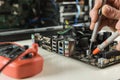 A technician checks the serviceability of the computed