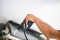 Technician cleaning air conditioner indoors, Repairman washing dirty compartments air conditioner, Maintenance and repairing Royalty Free Stock Photo