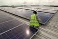 Technician Connecting Cable Solar Rooftop