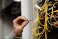 Technician connecting fiber optic