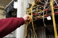 Technician connecting fibre optic