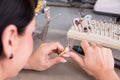 Technician at work in a dental lab or workshop producing a prostheis Royalty Free Stock Photo