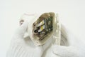 Technician disassemble IP camera on white background, , Home appliances repair service