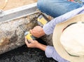 Technician drilling screw on concrete wall Royalty Free Stock Photo