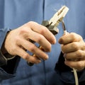 Technician or electrician working with wiring Royalty Free Stock Photo