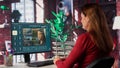 Technician employs AI chatbot on pc monitor and executing programming code Royalty Free Stock Photo