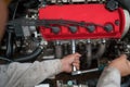 Technician engine checking car service