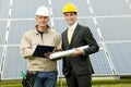 Technician and Engineer at Solar Power Station Royalty Free Stock Photo