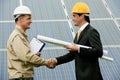 Technician and Engineer at Solar Power Station Royalty Free Stock Photo