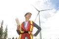 A Technician woman Engineer in Wind Turbine Power Generator Station