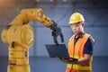 Technician or engineer work with robot Royalty Free Stock Photo