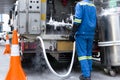 Technician fill with liquid nitrogen with Nitrogen storage tank Royalty Free Stock Photo