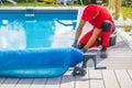 Technician Finishing Pool Deck Installation