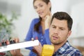 technician fixing kitchen Royalty Free Stock Photo