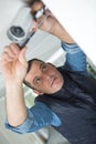 technician fixing video surveillance camera Royalty Free Stock Photo