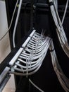 Technician hands installing network cables in server rack Royalty Free Stock Photo