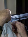 Technician hands installing network cables in server rack Royalty Free Stock Photo