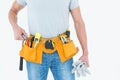 Technician holding gloves and hammer Royalty Free Stock Photo