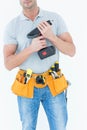 Technician holding handheld drill Royalty Free Stock Photo