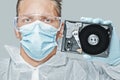 Technician holds the hard disk Royalty Free Stock Photo