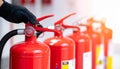 Technician Inspecting Fire Extinguisher Equipment Royalty Free Stock Photo
