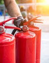 Technician Inspecting Fire Extinguishers for Safety (3 Royalty Free Stock Photo