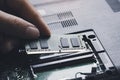 Technician install new RAM to memory slot Royalty Free Stock Photo