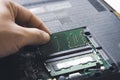 Technician install new RAM to memory slot Royalty Free Stock Photo