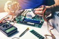 Technician installing computer hardware components