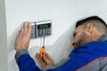 Technician Installing Security Access Alarm System Royalty Free Stock Photo