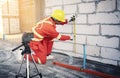 Technician with Laser measurement level Royalty Free Stock Photo