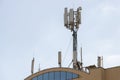 Technician maintenance on telecommunication tower doing ordinary maintenance control to an antenna for communication 3G 4G and 5G Royalty Free Stock Photo