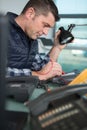 technician man repairing electronic device