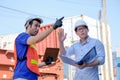 Technician and manager argue with the problem in cargo containers shipping area