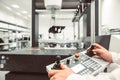 Technician measuring plastic moldings on a 3D measuring system in industrial smart factory, industry concept