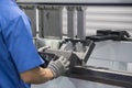 The technician operator working with hydraulic press brake bending machine Royalty Free Stock Photo