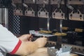 The technician operator working with press brake hydraulic bending machine. Royalty Free Stock Photo