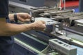 The technician operator working with press brake hydraulic bending machine. Royalty Free Stock Photo