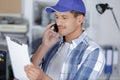 technician on phone at warehouse Royalty Free Stock Photo