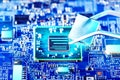 Technician plug in CPU microprocessor to motherboard socket. Royalty Free Stock Photo