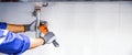 Technician plumber using a wrench to repair a water pipe under the sink. Concept of maintenance, fix water plumbing leaks, replace Royalty Free Stock Photo