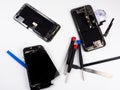 Close-up photos showing process of mobile phone repair, changing the screen. Royalty Free Stock Photo