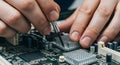 technician repairing and assembling a desktop computer inside a case Royalty Free Stock Photo