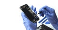 Technician repairing the Cell phone parts and tools for recovery repair smartphone