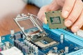 Technician repairing computer hardware in the lab