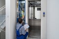 Technician Repairing Elevator