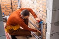 Technician servicing an hot-water heater. Royalty Free Stock Photo