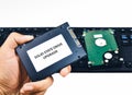A technician shows a Solid State Drive SSD hard disk Royalty Free Stock Photo