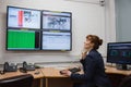 Technician sitting in office running diagnostics Royalty Free Stock Photo