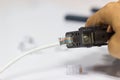 Technician to install an RJ45 connector on a CAT5 Royalty Free Stock Photo